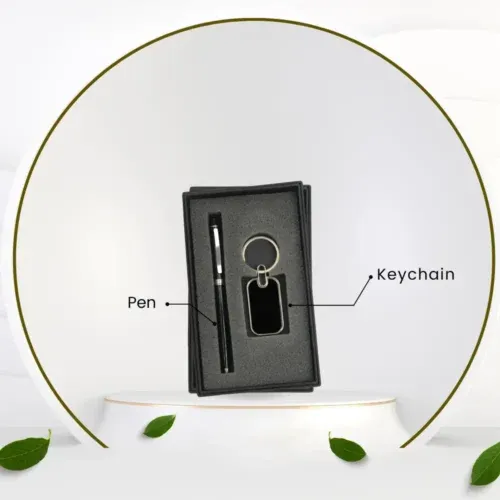 Sleek black presentation box containing a metal pen and a matching black rectangular keychain, ideal as a sophisticated, practical item for an Employee Welcome Kit.