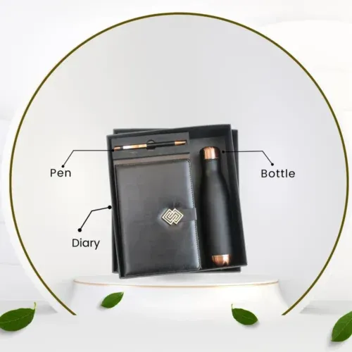 Employee Welcome Kit: Premium black gift set with a gold-accented diary, rose gold water bottle, and matching metallic pen.
