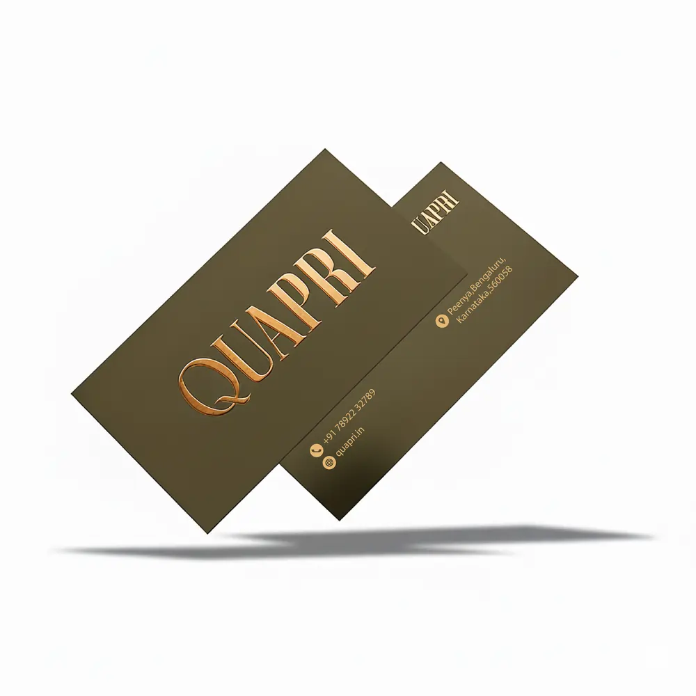 Two dark olive business cards for "QUAPRI" with gold lettering, featuring contact info and a Bengaluru, Karnataka address